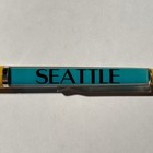 Seattle Washington Floaty Pen Monorail Train Car Moves By City And Space Needle