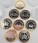Las Vegas Lot Of 8 Silver Strike  10 Gaming Token  999 Four Queens