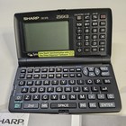 Vintage Sharp Wizard Oz-570 Pocket Organizer Phone Book Calculator Date Schedule