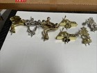 A Lot Of 22 Trophy Toppers Metal 15 Plastic Seven Gold And Silver In Color