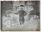 Antique Glass Photo Negative  Young Boy Posing With His Plants In The Garden
