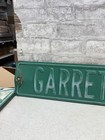 Vintage Embossed Steel Garrett St Street Sign Green White Metal Road Americana