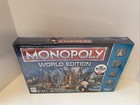 Monopoly Here   Now World Edition Board Game New Sealed  By Hasbro Gaming