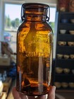    awesome    Orange Amber Half Gallon Trademark Lightning Mason Fruit Jar