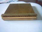 Vintage Ribbed Gold Tone Volupte Powder Compact  unused 