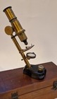 An Unusual Small Tilting Microscope With Cast Iron Stand  France  Circa 1880