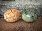 2 Polished Stone Carved Eggs spheres Green   Orange Marble Look