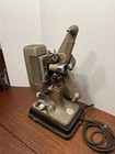 Revere Model 48 16mm Film Projector W original Case   Cord Works  Frame Cracked