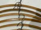 Lot Of 9 Vintage Wooden Curved Hangers 7- Unbranded 1- Floral  1-advertisement