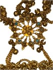 Gold Tone Ornate Metal Hand Chain With Blue Accents