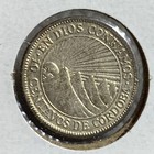 1928 Nicaragua 10 Centavos Silver Coin  Au