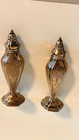 A Set Of Sterling Silver Salt And Pepper Shakers Marked A Crown And Cross   696