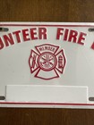 Metal Volunteer Fire Department License Plate    sealed   