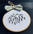 Small Hand Embroidered Mountain Forest Round With Bow  Black  Green And White