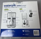 Waterpik Evolution And Nano Water Flosser Combo Pack System  new   sealed 