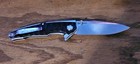 M390 Drop Point Folding Pocketknife Black Handle Manual Opening