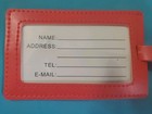 Four Piece Orange Luggage Tag Set 