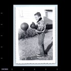 Old Vintage Photo Solo Boy With Boxing Gloves Punching Bag In Yard Snapshot