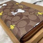 2026 Coach X Peanuts Long Zip Around Wallet With Snoopy Woodstock friends Ce705