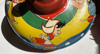 Antique Tin Spinning Top Toy Plunger W dutch Children Ice Skater Ski Made In Usa
