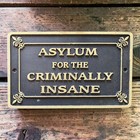 Asylum For The Criminally Insane Cast Iron Embossed Plaque