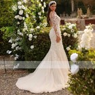Luxury Beaded Round Neck Wedding Dress Applique Long Sleeved Mermaid Bridal Gown