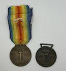 Two Italian World War One Victory Medals One With A Miniature Medal Attached