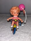 Vintage Happy Days Mechanical Tin Wind Up Toy  Girl On Tricycle Pink Balloon