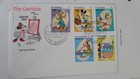   Lot G   The Disney World Of Postage Stamps Gambia   Ghana   Grenada W  Binder