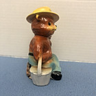 Vintage Norcrest Smokey The Bear Ceramic Coin Piggy Bank On Stump Holding Bucket