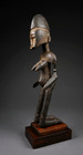 A Senufo Kneeling Female Devotee Sculpture