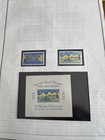 Lot Of 11 Pages Of Assorted Worldwide Stamps