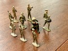 Nine Antique vintage Metal Toy Soldiers