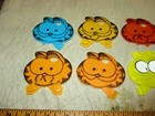 Vintage Lot Of 8 1978 Kellogg s Garfield Cat Face Bicycle Spoke Reflectors  Used