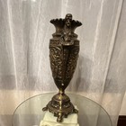 Ornate Brass Vase With Figural Handles  Fluted Rim   Relief Design