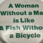 Vintage Button Pin 1970   s A Woman Without A Man Is Like A Fish Without A Bike
