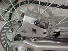 Works Connection - 25-020 - Aluminum Rear Brake Caliper Guard - Made In Usa