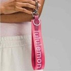 Lululemon Never Lost Keychain Wordmark Sakura Pink washed Mauve white