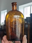  rare  Applied Top Hugh Dolan Amber Pint New York Strap Sided Advertising Flask