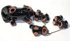 Vintage Red Ware Skunk   Family  4 Chained  Figurines