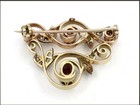 3ct Oval Cut Lab Created Garnet Women s Brooch Pin 14k Yellow Gold Finish Silver