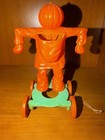 Vintage Halloween Pumpkin Scarecrow Pull Toy Rosbro Style Plastic Orange Wheels