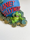 Vintage Planet Hollywood Vinyl Globe Coin Piggy Bank Crocodile And Dinosaur