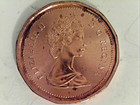 1985 Canadian Penny  Pointed 5   A Few Spots Or Stains 
