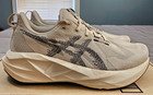 Asics    men s 9 5 M  Novablast    5 Running Shoes In Oatmeal black -  150