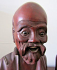Antique Asian Ornate Carved Wood Man   Woman Busts - Riveting Glass Eyes 
