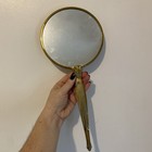 Vintage Hand Mirror Gold Tone Handle Embroidered Background