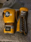 Used In Excellent Condition  14 Oz Gold Brown  Silver New Sporting Boxing Gloves