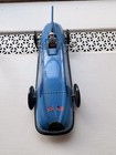 Vintage Blue Tin Wind-up Race Car Toy With Driver And Flags For Ages 8-11 Years