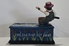 Cast Iron Mechanical Coin Bank  the One That Got Away 